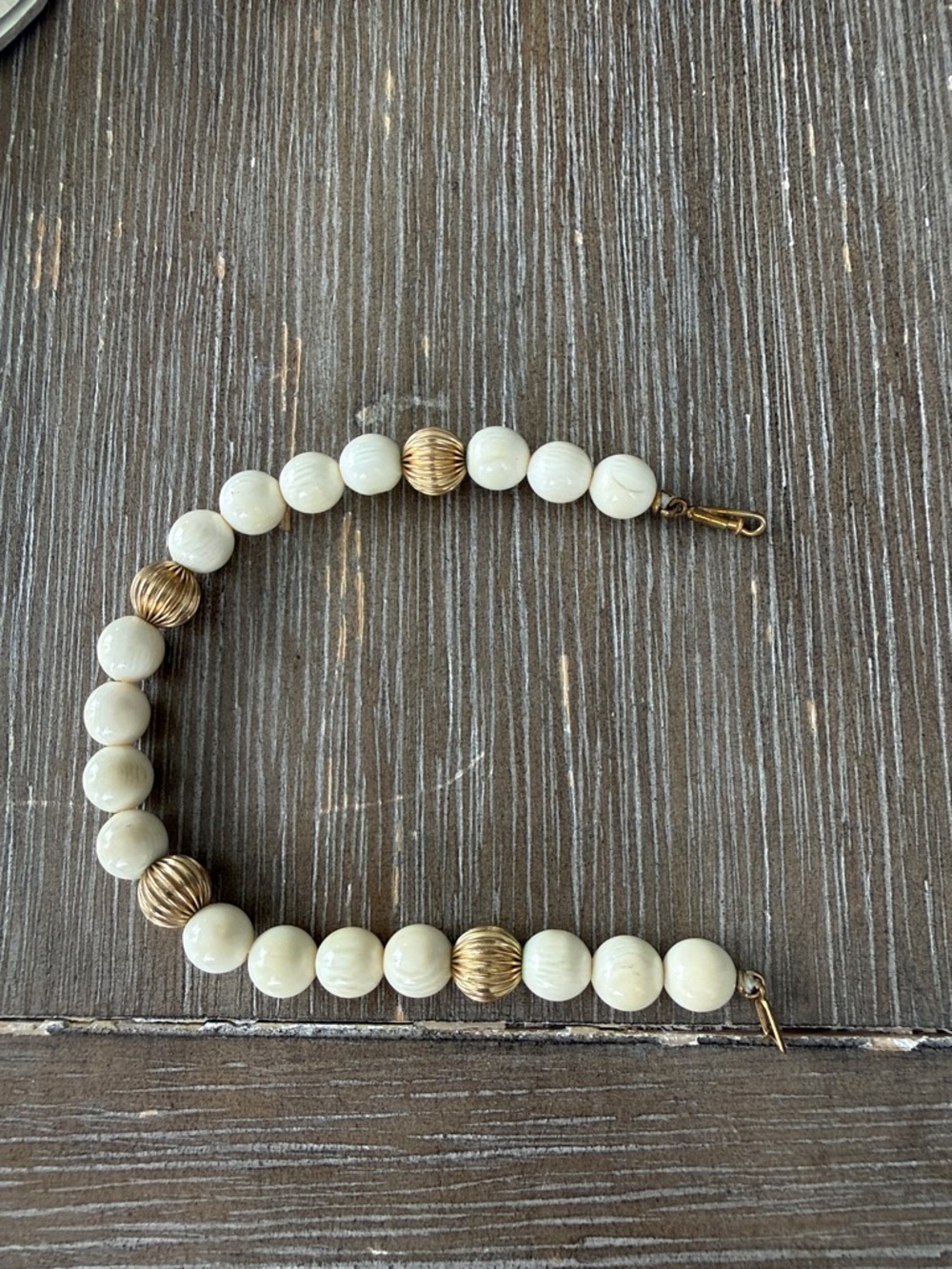 Elegant Cream Bead bracelet with Gold Accents